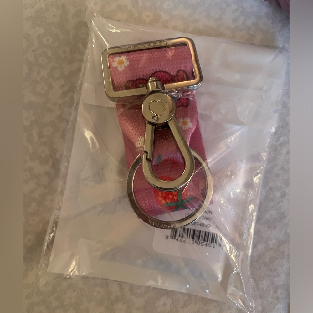 Disney Harveys Lotso Berry Foldover Crossbody Bag with Click n Go Keychain - Picture 3 of 8
